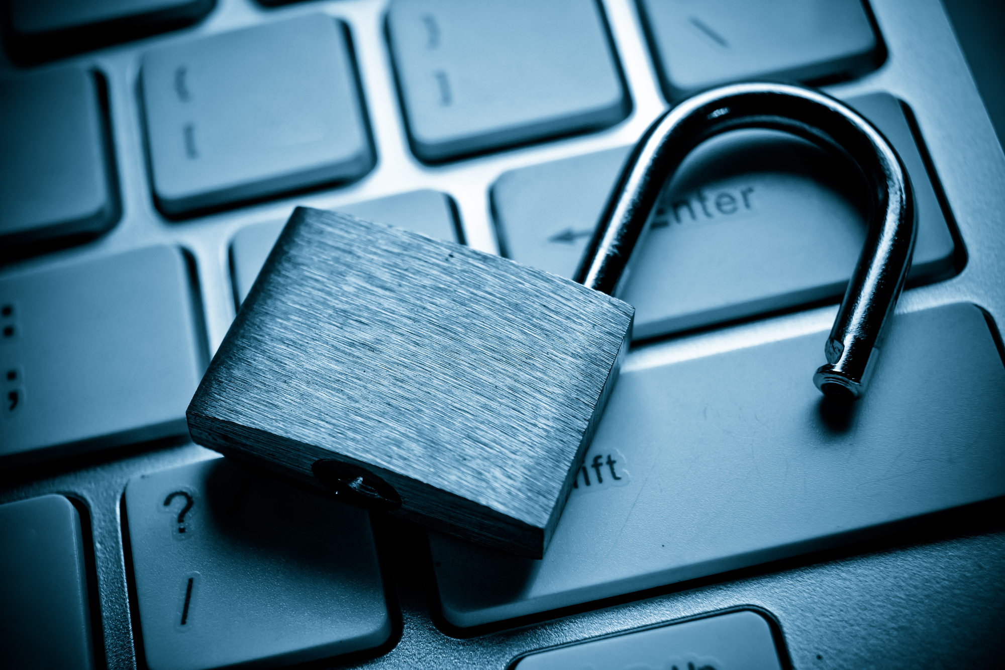 Lock on a laptop signaling a data breach.